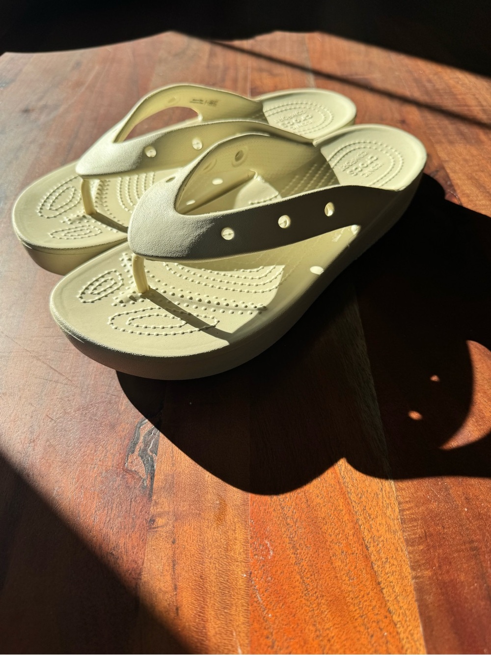CROCS Women's Foam Flip Sandals in Bone